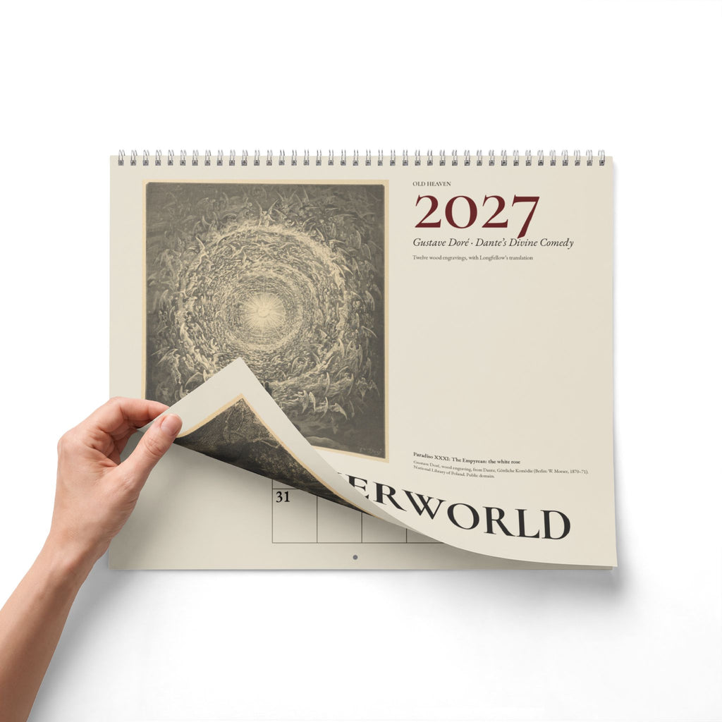 Mockup: a hand lifting the front cover of the 2027 Doré wall calendar to show the pages beneath