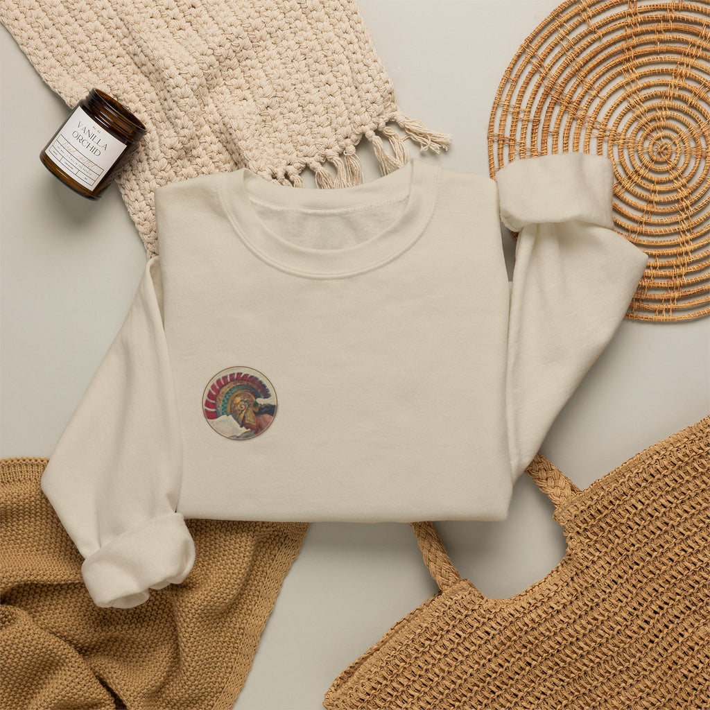 Sand Athena Vintage sweatshirt laid flat with lifestyle props, circular Athene chest print; N. C. Wyeth, 1929, from Homer's Odyssey (public domain); Old Heaven.