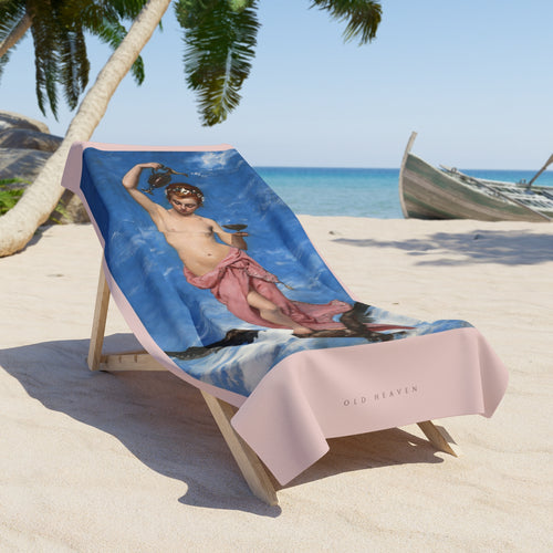 Hebe art towel draped over a wooden beach chair on the sand, the painting on a pale pink ground